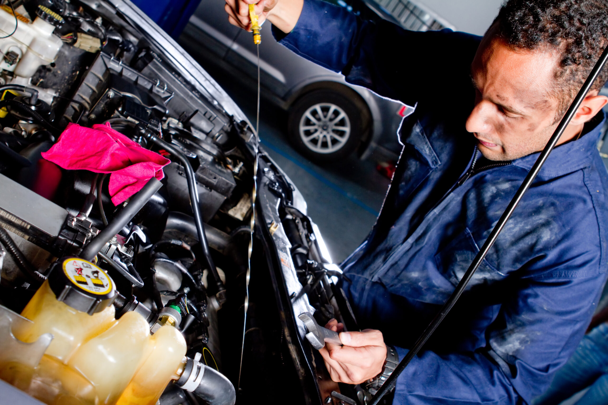 mechanic fixing a car at the garage 2026 04 14 01 03 25 utc scaled